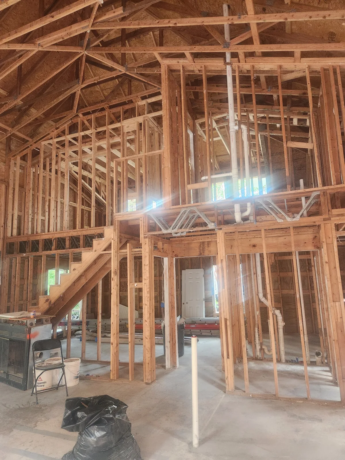 Branch wiring and temporary lights in a newly framed home
