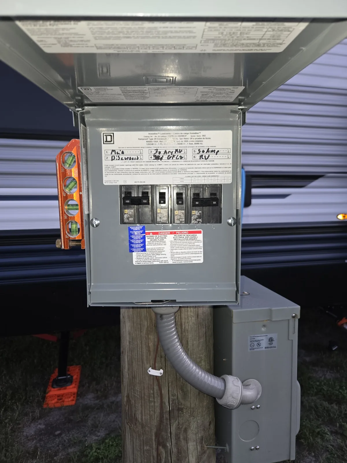 Outdoor generator transfer equipment mounted beside a meter