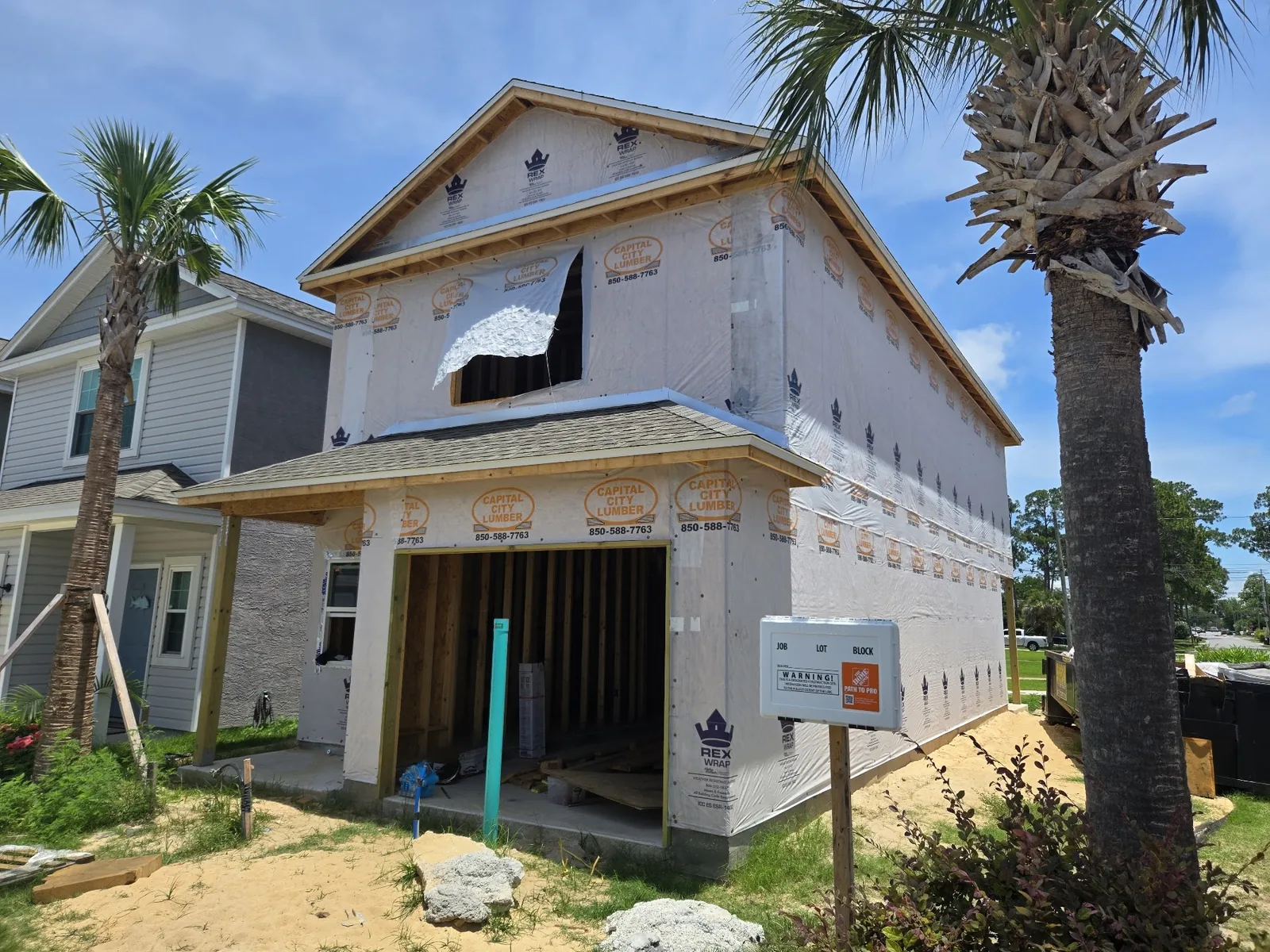 New two-story home during exterior finishing