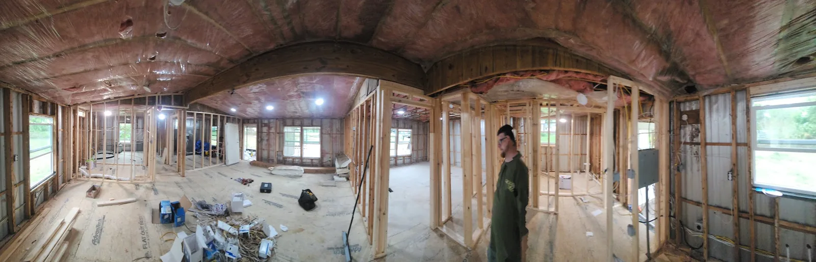 Wide view of electrical rough-in throughout a framed home