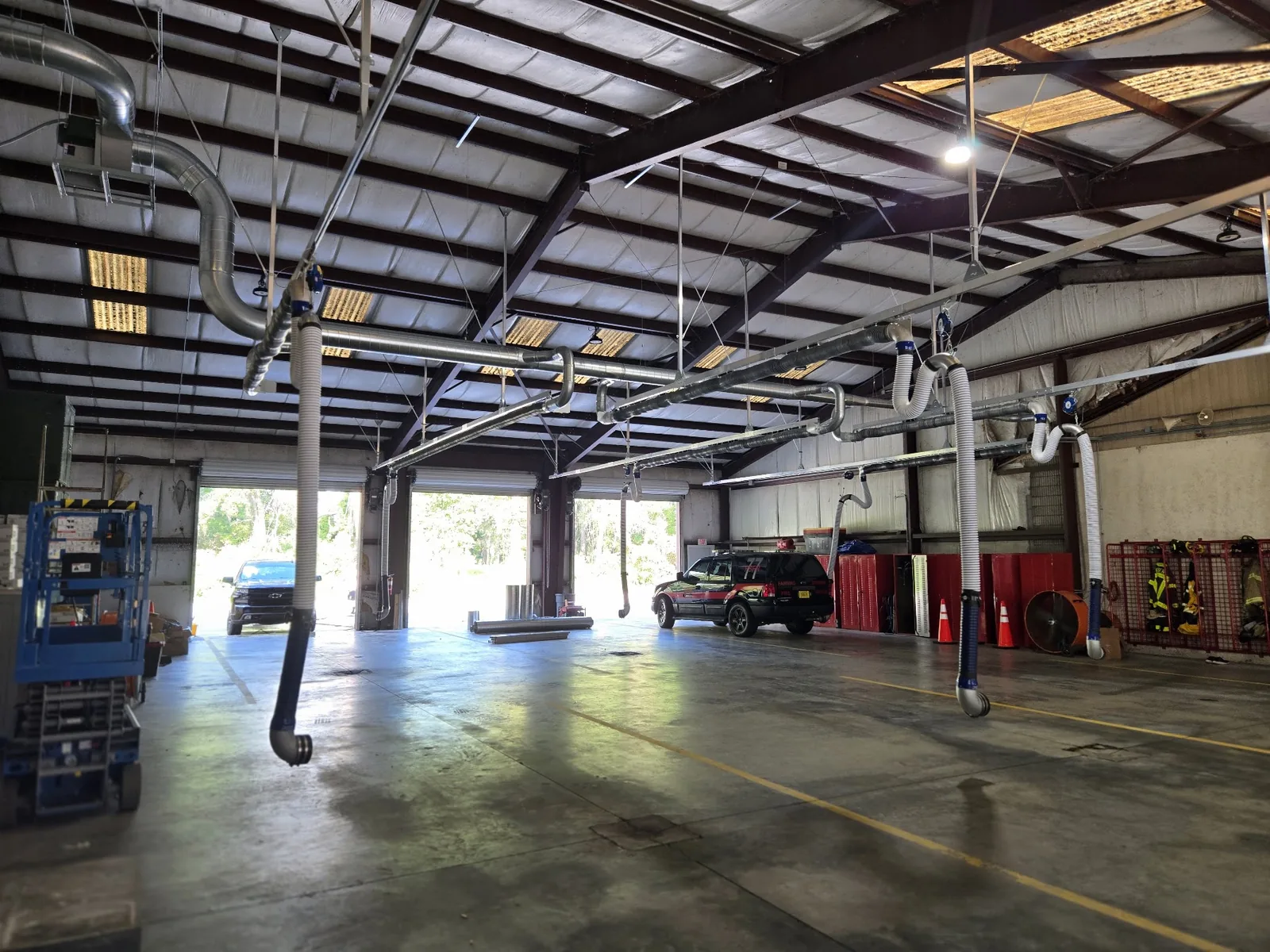 Large open shop with overhead electrical and lighting installation